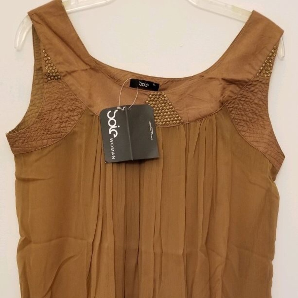 New never worn sleeveless tunic with detail yoke.